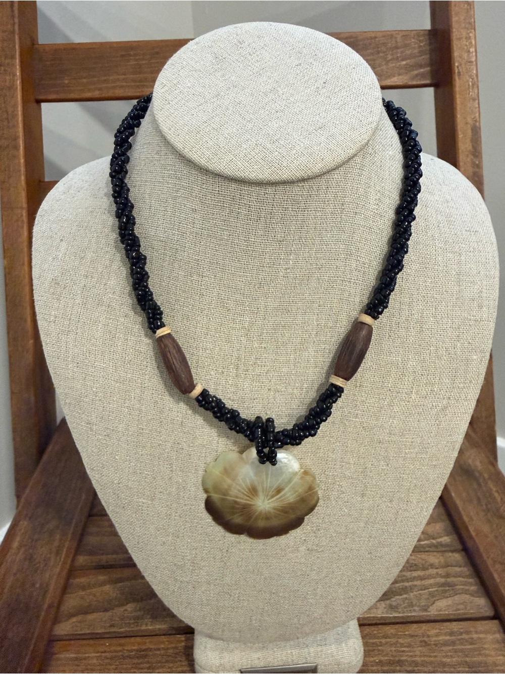 Vintage Black Beaded Necklace with Carved Floral Pendant